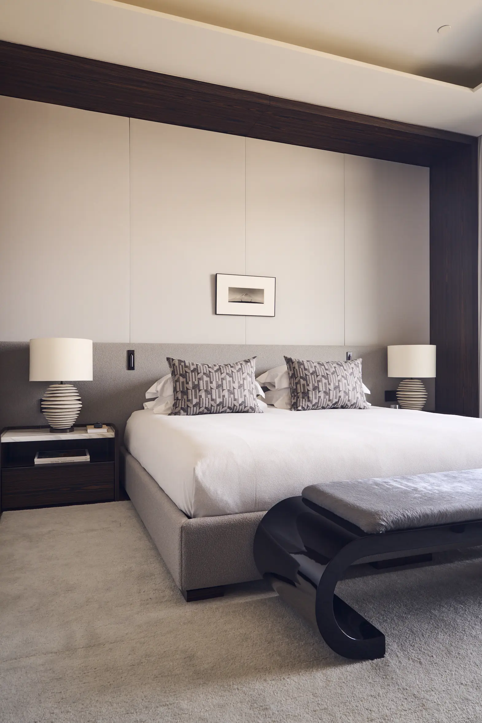 Bedroom framed in dark timber